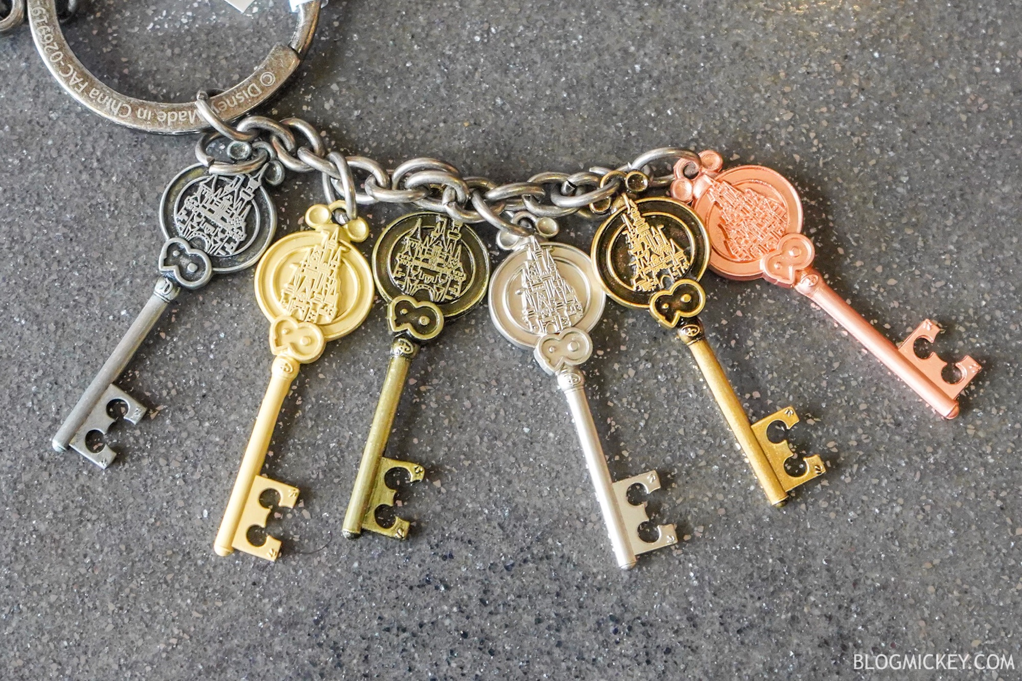 PHOTOS: Mickey 90th Keychain Released Featuring All Disney Castles Worldwide