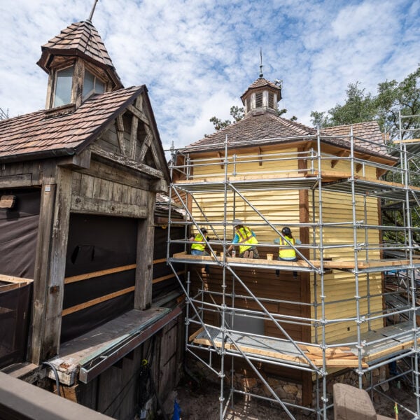 Former Splash Mountain Entrance Barn Repainted Yellow for Tiana’s Bayou Adventure Overhaul at Magic Kingdom
